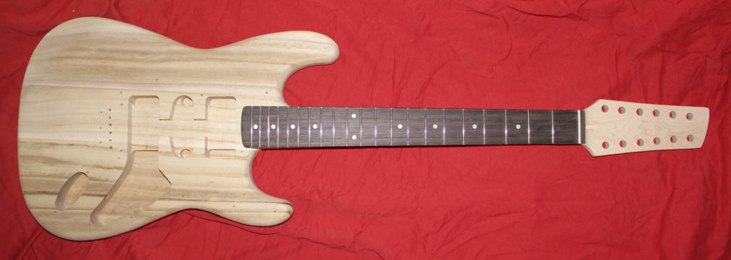 Total with sculpted headstock